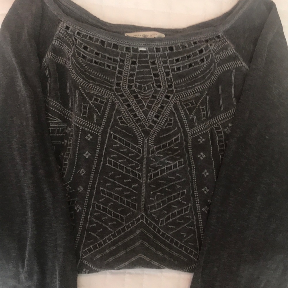 Woman’s casual grey top